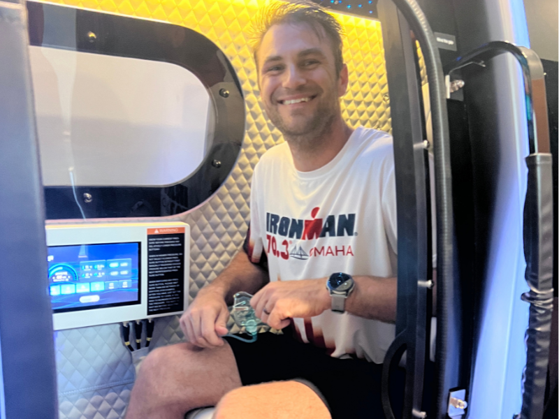 Ironman endurance athlete in a hyperbaric oxygen therapy (HBOT) chamber at Lost in Float in Lincoln NE